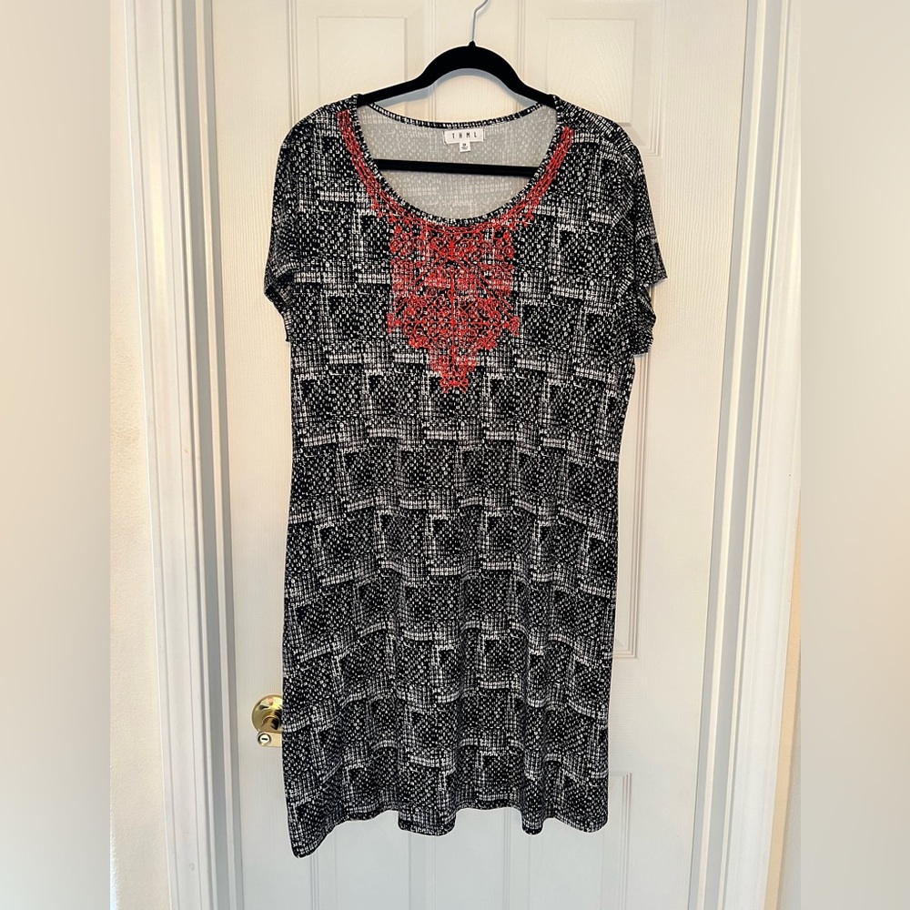 Light-weight above the knee dress with pockets.